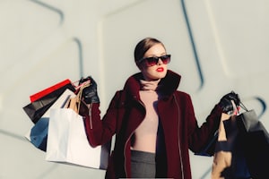 Woman in western fashion with shopping bags